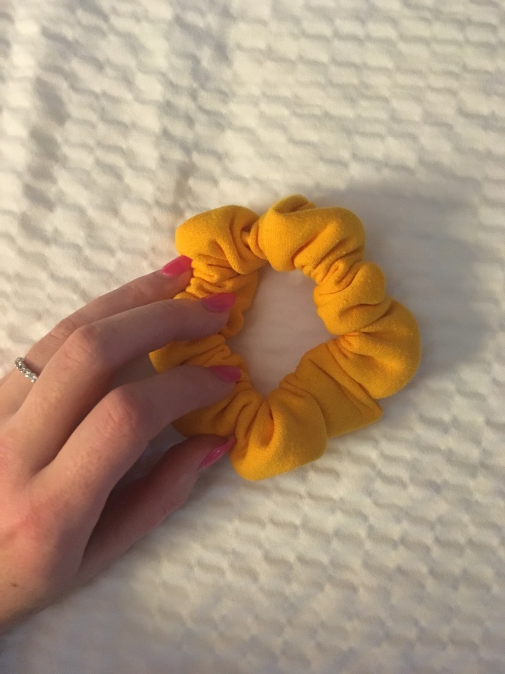 “You have your leading lady running all over town wearing a scrunchie. A SCRUNCHIE!”